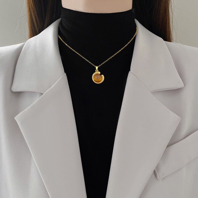 Elegant Amber Teardrop & Swirl Necklace Set