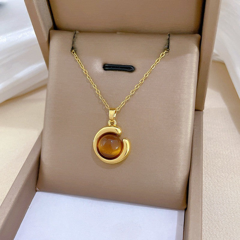 Elegant Amber Teardrop & Swirl Necklace Set