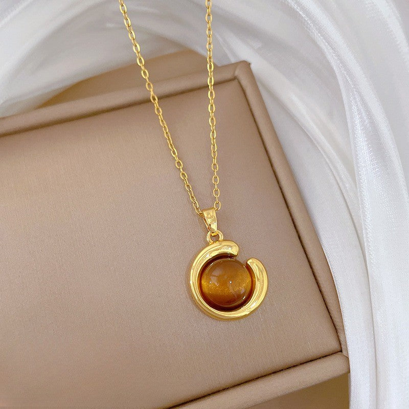 Elegant Amber Teardrop & Swirl Necklace Set