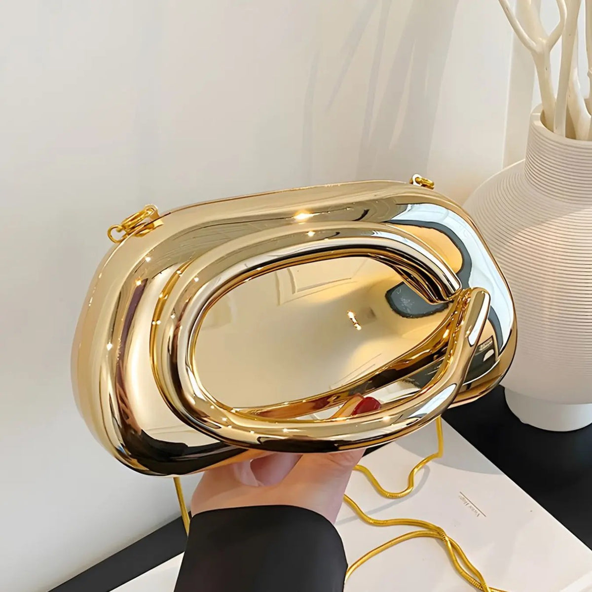 Elegant Metallic Oval Clutch