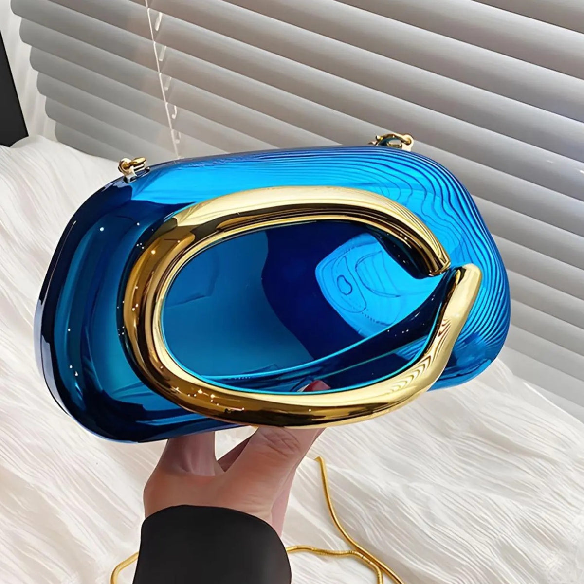 Elegant Metallic Oval Clutch