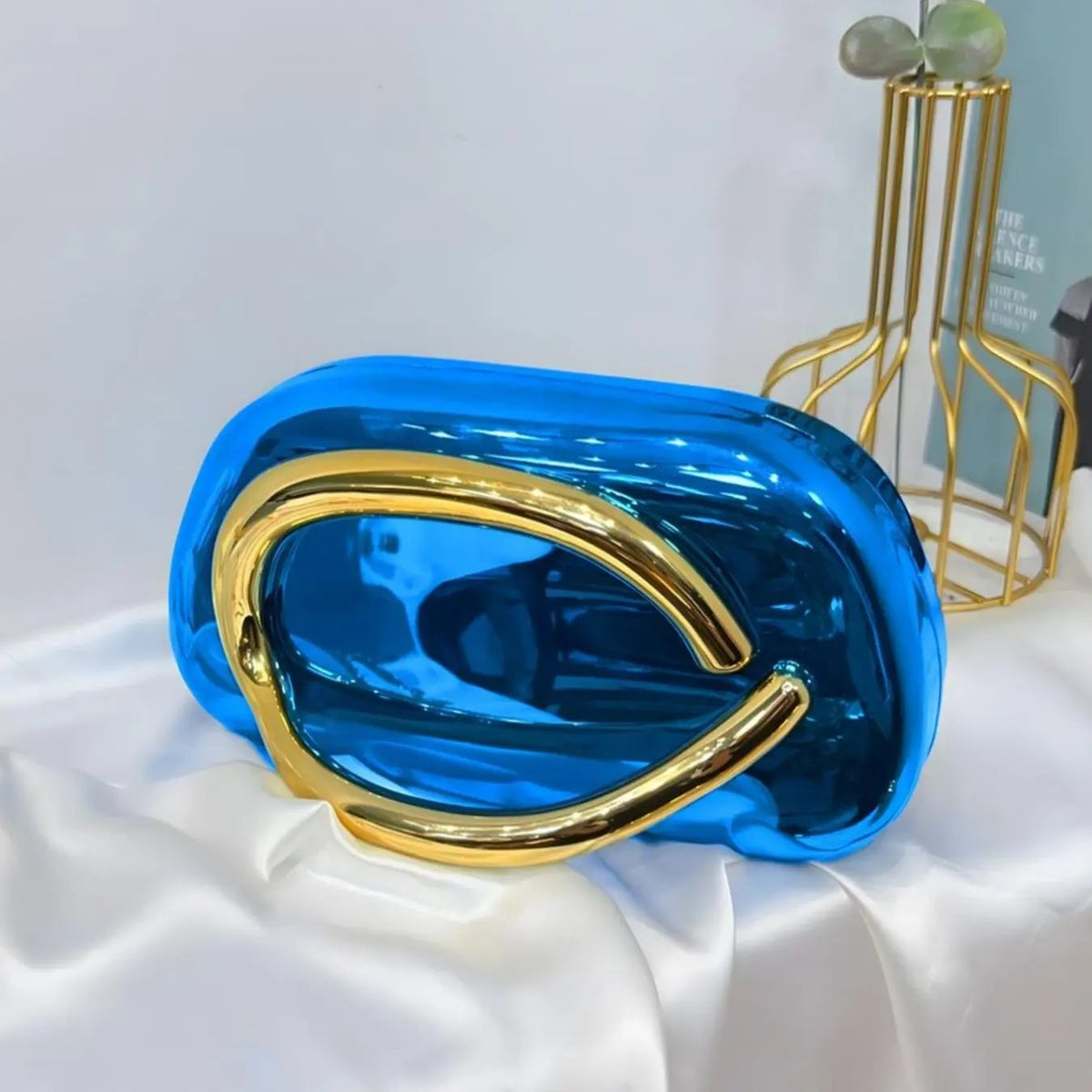 Elegant Metallic Oval Clutch