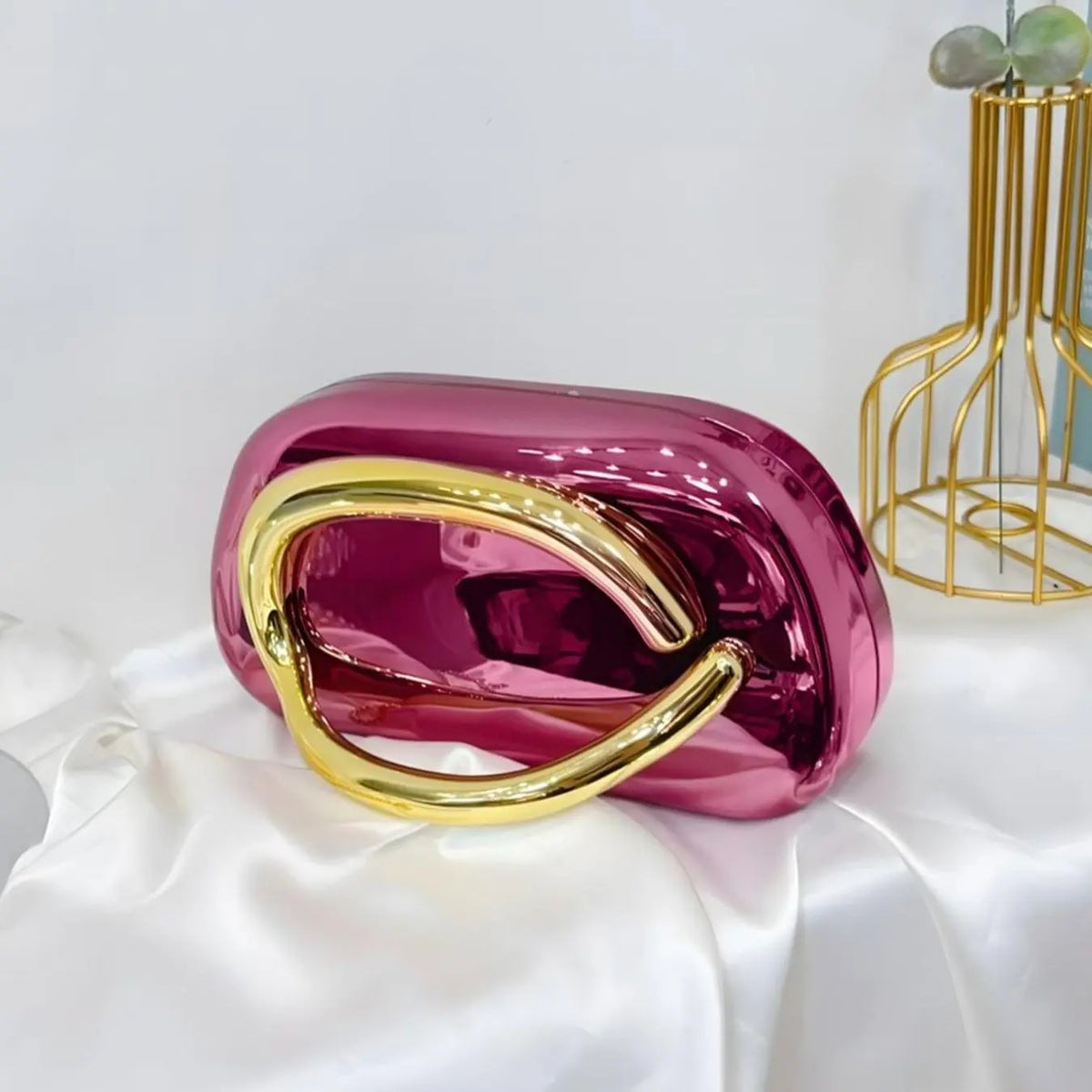 Elegant Metallic Oval Clutch