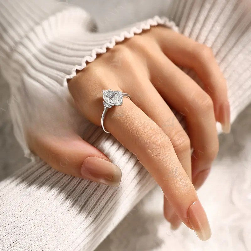 Elegant Marquise Side Stone Ring