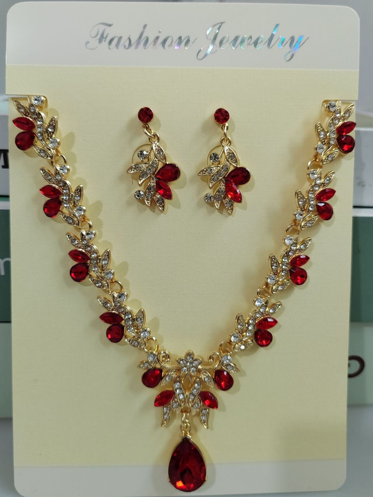 Elegant Emerald Teardrop Leaf Necklace & Earring Set